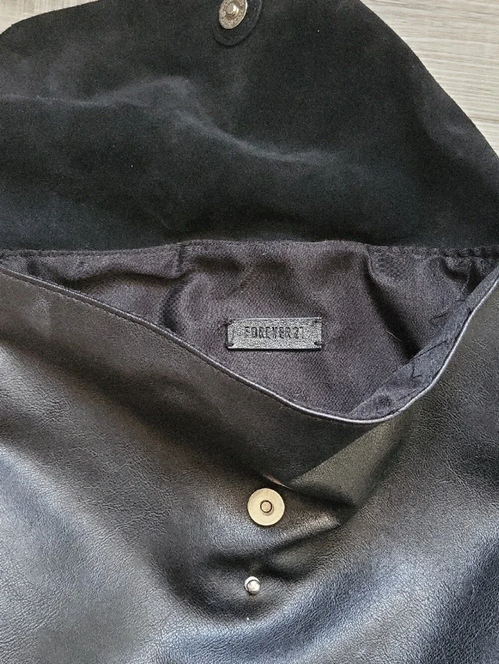 Black Faux Leather and Suede Fold-Over Backpack